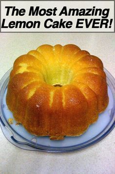 the most amazing lemon cake ever on a plate with an advertise above it