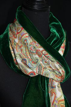 "Very soft in touch and luxurious double sided scarf made with silk velvet (30%silk, 70% viscose) in plain emerald green one side and 100% high quality pure silk satin, with colour matching, classic abstract pattern on the other side. Both shorter edges of the scarf are decorated with  single row of tiny green/yellow beads. The scarf has got a generous size and can be worn in several different ways. It drapes beautifully, the velvet side plays with both natural and artificial light. And it will Green Silk Scarves For Formal Occasions, Formal Green Silk Scarves, Green Silk Scarf For Party, Elegant Green Scarves For Party, Green Silk Scarf For Formal Occasions, Elegant Green Scarf For Formal Occasions, Elegant Green Shawl For Party, Formal Green Silk Scarf, Green Silk Shawl Scarf