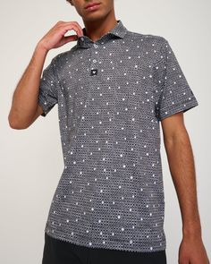 No matter what you shot, wearing this polo will cause something similar to a block party on the 18th green. Casual Golf Polo Shirt With Graphic Print, Fitted Golf Polo Shirt With Graphic Print, Fitted Graphic Print Polo Shirt For Golf, Casual Black Polo Shirt For Golf, Collared Golf Tops For Summer, Summer Golf Polo Collar Top, Summer Golf Polo Top, Cotton Golf Tops, Black Graphic Print Polo Shirt For Golf