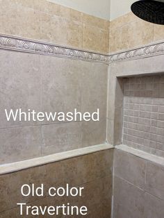 a shower with whitewash and old color traverine