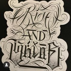 some type of lettering that is on the back of a black and white book cover