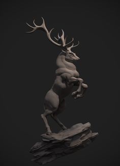 a statue of a deer standing on its hind legs