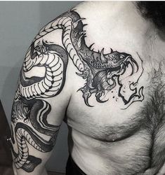 a man with a dragon tattoo on his chest