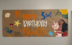 a happy 3rd birthday banner hanging on the wall