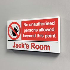 there is a sign on the wall that says, no unattended persons allowed beyond this point jack's room