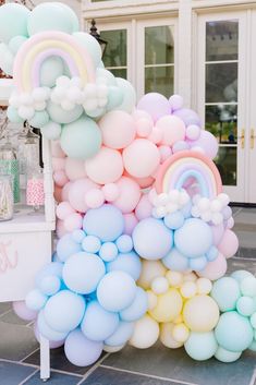 a bunch of balloons that are on the ground