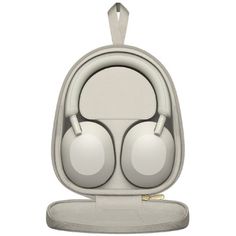 the headphones are attached to an earphone holder with two headsets in it