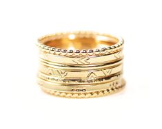 Unleash your wild and adventurous spirit with our Wanderlust Stacking Rings, meticulously handcrafted by our talented artisans to embody dynamic energy and movement. Handcrafted from .925 Sterling Silver or 14kt Yellow Gold Filled, these rings feature captivating patterns and textures, ensuring a truly unique and exhilarating stack. Custom-made to order, you have the freedom to curate your ideal combination. Choose from a selection of fine metals and styles, and watch as your stack takes shape, Adjustable 14k Gold Bohemian Jewelry, Adjustable Bohemian 14k Gold Jewelry, Bohemian Gold Stackable Sterling Silver Rings, Bohemian Gold Stackable Rings In Sterling Silver, Adjustable Yellow Gold Jewelry With Decorative Band, Bohemian 14k Yellow Gold Rings, Adjustable Etched 14k Gold Jewelry, Adjustable Decorative Band Ring, Adjustable 14k Gold Etched Jewelry