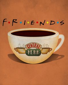 a cup of coffee sitting on top of a table next to a sign that says friends