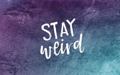 the words stay weird written in white on a blue and purple background