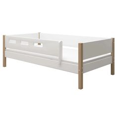 a white bed frame with wooden slats