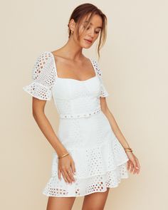 Pricing Comparison Few Moda $69 ALEXIS $625 Zimmermann $550 Product Details The Bobbi Dress features a corset-style bodice and belt detail that offers a flattering silhouette, while the ruffled skirt creates a fresh and feminine look.- Side zipper- Adjustable belt- Lined- Content: 100% Cotton Style# T23WDR09134 Fit Notes - Model wearing a size S - Model measurements: 5'10.5'' Height / 34'' Bust / 25'' Waist / 36'' Hips- Garment measurements: Size Length Bust Waist XS 61.28 78.74 63.5 S 62.23 82. Ruffled Skirt, Corset Style, Feminine Look, Adjustable Belt, Butterfly Print, Cotton Style, S Models, Model Measurements, Homecoming Dresses