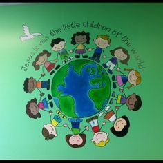 a green wall painted with children's drawings and the words we are the little children of god