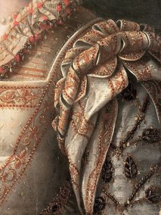 a painting of a woman in an ornate dress