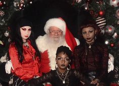 an old photo of santa and his family