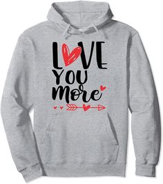 a grey hoodie with the words love you more and an arrow in red on it