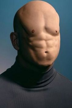 a man's head and torso is shown in front of a blue background