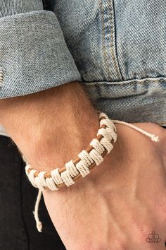 Sections of rustic white cording interweave and knot around three rows of brown leather cords, creating an earthy checkered pattern around the wrist. Features an adjustable sliding knot closure. Paracord Bracelet Tutorial, Diy Leather Bracelet, Sliding Knot Closure, Adjustable Sliding Knot, Brown Bracelet, Cord Jewelry, Paracord Projects, Paracord Bracelet, Men's Bracelet