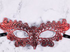 I just love the colors mixed in this beautiful masquerade mask the fire red color and hint of black make the design of the mask stand out and look so elegant. This is a very elegant but yet very comfortable to wear for the long hours of the masquerade parties. I hope you like this mask if you wish it to be all black or any color you to match the clothes for the night please feel free to contact me that will not interfere with the shipping dates or the price. Please take a look at my shop I have Queen Of Hearts Masquerade, Masquerade Mask Lace, Noir Font, Red Masquerade Mask, Red Masquerade, Masked Ball, Lace Mask, Masks Masquerade, Masquerade Party