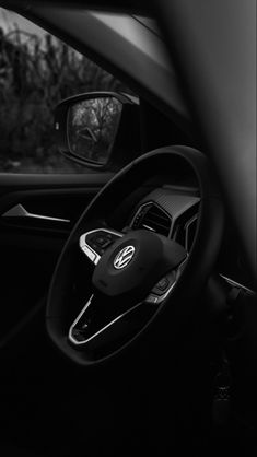 the interior of a car is shown in black and white