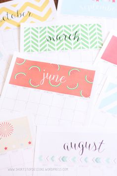 some cards that are on top of each other with the word june written in them