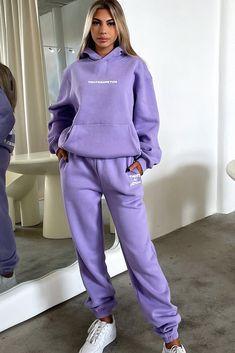 Trendy Sweatpants With Elastic Cuffs For Leisure, Trendy Leisure Sweatpants With Elastic Cuffs, Casual Purple Sweatpants For Loungewear, Purple Athleisure Joggers For Loungewear, Purple Athleisure Sweatpants For Loungewear, Trendy Drawstring Sweats For Loungewear, Trendy Cotton Tracksuit For Spring, Winter Leisure Bottoms With Elastic Cuffs, Spring Letter Print Joggers For Loungewear