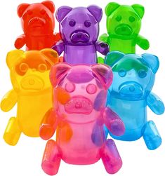 five different colored teddy bears sitting next to each other in the same color and shape