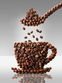 coffee beans falling into a cup with the caption let us please observe and smell for the many brave coffee beans