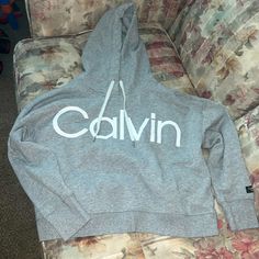 Size Large Grey Calvin Klein Cropped Hoodie With White Strings. Never Worn, Brand New Without Tag. Sporty Calvin Klein Winter Tops, Calvin Klein Hoodie With Drawstring Hood For Winter, Calvin Klein Fall Streetwear Hoodie, Calvin Klein Hooded Hoodie For Fall, Calvin Klein Winter Hoodie With Drawstring Hood, Calvin Klein Hoodie Sweatshirt For Fall, Calvin Klein Hooded Sweatshirt For Winter, Calvin Klein Hooded Winter Sweatshirt, Calvin Klein Hooded Sweatshirt For Fall