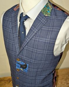 I have tailored this Next waistcoat by trimming the collar with cotton William Morris Strawberry Thief and Blackthorn, a centre front patch in grey Willow Bough, and added a Henry Glass designer cotton blackbird. The front is blue black and lightest grey tartan polyester viscose blend that has a bit of stretch for comfort and looks like real wool. The lining and back are a floral print silk like satin. The front pockets are trimmed in darkest blue velvet, adjustable strap in the back. It will fi Blue Tartan, Mens Vests, Vest Outfits, Blue Velvet, William Morris, Black Bird, Silk Printing, Blue Black, Dark Blue