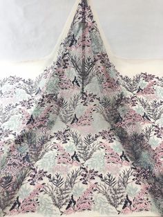 We offer a variety of fashion handmade fabric，those are widely use for wedding dress，garment and fashion cloth. we sell it by yard，our minimum order is 1 yards，and we always package it 15 yards for one roll，the width is 125cm Material ： mesh ，Rayon,polyester. Symmetrical embroidery floral pattern, with lovely flowers in the middle, scalloped border. You can also cut and use separately. Perfect for dress, tops, wedding veil. You can split the piece up and have one scalloped edge around the veil a Multicolor Tulle Fabric For Summer Wedding, Multicolor Summer Wedding Tulle Fabric, Multicolor Sequin Fabric For Spring Wedding, Spring Multicolor Sequin Fabric For Weddings, Summer Wedding Embroidered Fabric With Floral Print, Summer Wedding Embroidered Floral Fabric, Summer Wedding Floral Print Embroidered Fabric, Pink Floral Embroidered Sequin Fabric For Spring, Spring Pink Sequin Fabric With Floral Embroidery