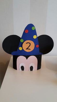 a mickey mouse birthday hat with the number 2 on it's face and ears