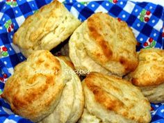 a blue and white basket filled with biscuits