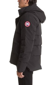 From a blustery urban commute to an alps getaway, this parka protects from the coldest chills with its lofty down insulation and draft-resistant fit. Double-stacked hand-warmer pockets lined in fleece, plus three interior pockets, keep all your essentials secure, while interior backpack straps allow you to carry it hands-free over the shoulders when the temps begin to rise. 28" front length; 30" back length (size Medium) Down-filled snorkel hood with removable zip guard; chin guard Inset rib cuf Canada Goose Macmillan, Canada Goose Logo, Canada Goose Parka, Slim Fit Coat, Canada Goose Mens, Puffer Parka, Duck Down Jacket, Hooded Parka, Down Parka