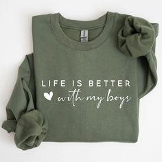 "Life is Better With My Boys" Sweatshirt and Hoodie celebrates the special bond between a mother and her sons. Perfect for moms who cherish the joys and adventures of raising boys, this sweatshirt is a great Mother's Day gift. Show your appreciation for the mom of boys in your life with this cozy and heartfelt gift! #MomOfBoys #MothersDayGift #LifeIsBetterWithMyBoys  ✨W H A T *  Y O U *  N E E D *  TO *  K N O W ✨ Due to the nature of the fabric as well as your monitor or mobile screen colors ma Boy Mom Sweater, Boy Mama Shirts, Gifts For Adult Son, Cricket Printer, Boy Mom Sweatshirt, Boy Mom Shirt, Mothers Of Boys, Mom Of Boys, Mom Of Boys Shirt