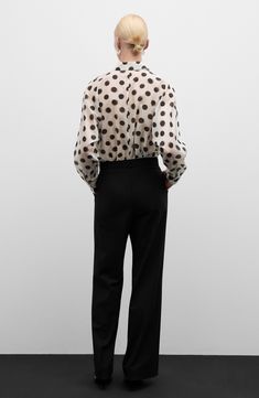 Blurry dots pattern this relaxed-fit button-up shirt that's subtly elevated by a hidden-button placket. Hidden-button placket Point collar Long sleeves with one-button cuffs 84% lyocell, 16% polyester Machine wash, line dry Imported Elegant Polka Dot Blouse For Work, Chic Polka Dot Blouse For Workwear, Elegant Polka Dot Tops For Work, Elegant Button-up Polka Dot Tops, Elegant Polka Dot Button-up Tops, Polka Dot Button-up Blouse For Work, Polka Dot Blouse With Button Closure For Workwear, Elegant Polka Dot Blouse With Buttons, Polka Dot Long Sleeve Blouse For Work