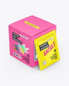 a pink box with a yellow package inside