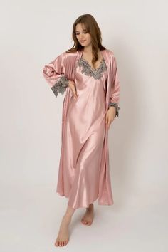 Lightweight and breathable, these soft satin nightgowns make the perfect loungewear for women who love to sleep in style. They're ideal for those who enjoy a more feminine sleepwear look and feel. Oblique V-Neck Long Robe with Lace 3/4 sleeve Fabric strings on the inside to hold the robe together and a removable belt t Feminine Sleepwear, Satin Nightgowns, Satin Sleepwear, Straight Clothes, Bandage Midi Dress, Silk Lingerie, Pink Fits, Half Skirt, Women's Nightgowns