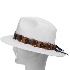 A lightweight woven fedora with a band of spotted feathers that sits gently on your head and offers excellent sun protection. The hat band is made from authentic feathers that have been carefully cleaned and never dyed. This hat is the ultimate wardrobe accessory that expresses your originality as well as your style. Straw Fedora Hat, Straw Fedora, Wardrobe Accessories, Hat Boxes, Hat Box, Quality Hats, Hat Band, Fedora Hat, Hat Making