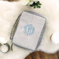 Our Monogrammed Bible Carrier Case not only keeps your bible in great shape, it provides a great place for you to keep bulletins, notes, highlighters and/or pens on hand during church services, small groups or bible studies. Our super-cute bible carrier features a handle or a wristlet for easy carrying and a bookmark for easy reference. This bible bag has a zip closure, a pen holder, and it features inner pockets to keep other belongings organized.This monogrammed bible cover is an elegant, thou Rectangular Monogram Canvas Bag With Lock, Bible Carrying Case, Everyday Rectangular Monogram Canvas Pouch, Luxury Monogram Canvas Rectangular Pouch, Rectangular Monogram Canvas Bags For On-the-go, Bible Bag, Cute Bibles, Marley Lilly, Script Monogram