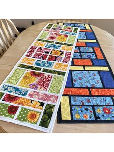 the table runner is laid out on top of the dining room table