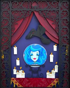 a paper cut out of a woman's face with candles around her and a bird on the wall