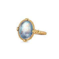 This oval Moonstone shimmers with iridescence, revealing faint orange streaks through a blue wash. This enchanting gem is set in a meticulously hand-crafted gold setting with braided gold and granulated prongs. One-of-a-kind.Ready to ship in size 7. Please allow 1-2 weeks for any other size. Technical Details Metal: 18k yellow goldMoonstone: 6.4 cts. Ring face: 16mm x 13mmBand width: 2mmHandmade in New YorkStyle # R-2709-MO Luxury Gold Moonstone Ring Oval Cabochon, Luxury Gold Moonstone Ring With Oval Cabochon, Luxury Gold Oval Cabochon Moonstone Ring, Heirloom Yellow Gold Moonstone Ring, Oval Cabochon, Heirloom Yellow Gold Oval Cabochon Moonstone Ring, Heirloom Yellow Gold Moonstone Ring, Heirloom Gold Moonstone Ring Oval Cabochon, Heirloom Gold Moonstone Oval Cabochon Ring, Celestial Oval Cabochon Moonstone Ring