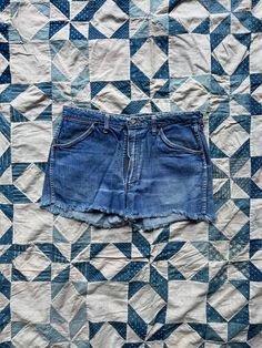 1960s Wrangler jeans turned into shorts. Made in USA. Gripper Zipper. Tagged as size 36 but measure 34. 12" rise. 2" inseam. Great wear throughout. Left as is.  If you have any questions, please send us a message. Couple stains on rear.  NGA *free shipping to lower 48 *all clothing is expected to have wear from age and use. Please review photos. All items sold as is. Vintage Cutoff Jean Shorts In Medium Wash, Vintage Medium Wash Cutoff Jean Shorts, Vintage Cutoff Jeans With Built-in Shorts, Retro Medium Wash Jean Shorts, Vintage Cutoff Cotton Shorts, Vintage Fitted Cutoff Jean Shorts, Fitted Vintage Cutoff Jean Shorts, Vintage Cotton Cutoff Shorts, Vintage Jeans With Built-in Shorts