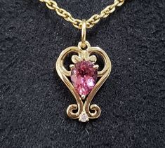 1. Pink Tourmaline 14k Gold Pendant 2. Art Deco  3. Gemstone - Natural Tourmaline, Diamond  4. Jewelry Type - Charms Pendant 5. Total Weight - 1.735 Gram Approx. 6. Tourmaline Weight - 0.55 Carats 7. Diamond Weight - 0.02 Carats 8. Gold Weight - 1.621 Grams Approx. 9. Gold Purity - 14k 10. Stone Size - 6x8 MM 11. Pendant Bails Outer Size - 6.50 mm 12. Stone Shape - Pear  13. Women Pendant 14. Ready to Dispatch in 1 - 2 days. 15. Handmade Items 16. AAA Quality Pendant 17. 1 Quantity Available 18. Formal Teardrop Tourmaline Jewelry, Elegant Pear-shaped Tourmaline Jewelry, Pear-shaped Tourmaline Jewelry As A Gift, Pear-shaped Tourmaline Jewelry Gift, Pear-shaped Tourmaline Jewelry For Gift, Gift Pear-shaped Tourmaline Jewelry, Black Gemstone Necklace, Dope Jewelry Accessories, Black Tourmaline Necklace