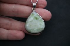 This one of a kind Scottish Green Marble pendant has been handmade of 925 Sterling Silver in our workshop. Scottish Green Marble was formed over 600 million years ago when molten volcanic rock pushed up from deep inside the earth through the overlying limestone. The area these stones are found is one of the most remote parts in the Highlands and Islands. In Scotland this beautiful stone has been highly revered since prehistoric times. Local people carried small pieces for protection. Please note Sterling Silver Untreated Teardrop Pendant, Silver Drop Jewelry With Large Stone, Sterling Silver Jewellery, Green Marble, Celtic Jewelry, Precious Metal, Sterling Silver Bands, Silver Jewellery, Pure Silver