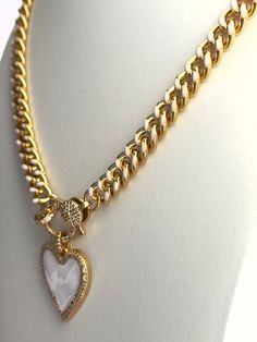 Dare to stand out with this captivating 18" front clasp heart necklace, accented with sparkling CZ stones and a luxurious gold plated finish. The perfect addition to your jewelry collection to add a touch of beauty and shine to any outfit! Gold Choker, Cz Stone, Gold Studs, Bag Straps, Heart Necklace, Silver Gold, Jewelry Collection, Gold Plate, Sparkle