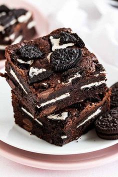 three oreo cookie brownies stacked on top of each other