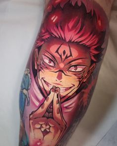 a person with a tattoo on their arm holding his hand up in front of his face