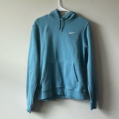 Brand New Never Worn Blue Nike Sweatshirt Blue Nike Hoodie For Loungewear, Nike Blue Hoodie For Loungewear, Light Blue Long Sleeve Sports Sweatshirt, Nike Long Sleeve Blue Sweatshirt, Nike Blue Sweatshirt Sportswear, Light Blue Sporty Sweatshirt For Sports, Light Blue Casual Sweatshirt For Sports, Sporty Light Blue Tops With Ribbed Cuffs, Light Blue Athleisure Top For Winter